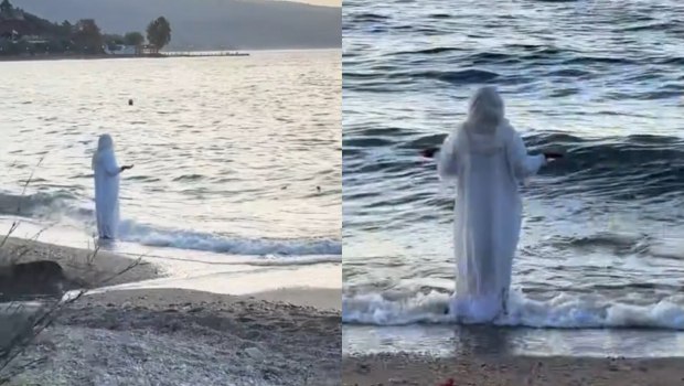 Το βίντεο που έγινε viral: Γυναίκα στα λευκά σε παράξενο τελετουργικό σε παραλία του Βόλου