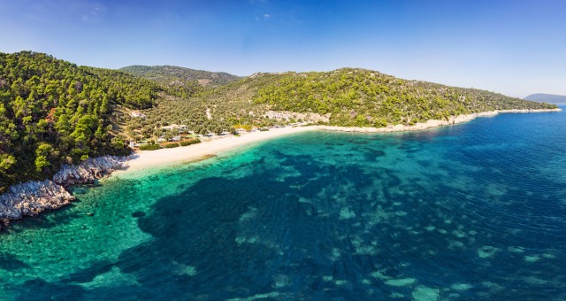 sandy-beach-organized-blue-sea-alonissos-relax-ferry-routes-tickets